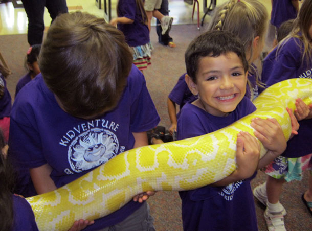 kids holding snake at a Preschool & Daycare Serving San Antonio, TX
