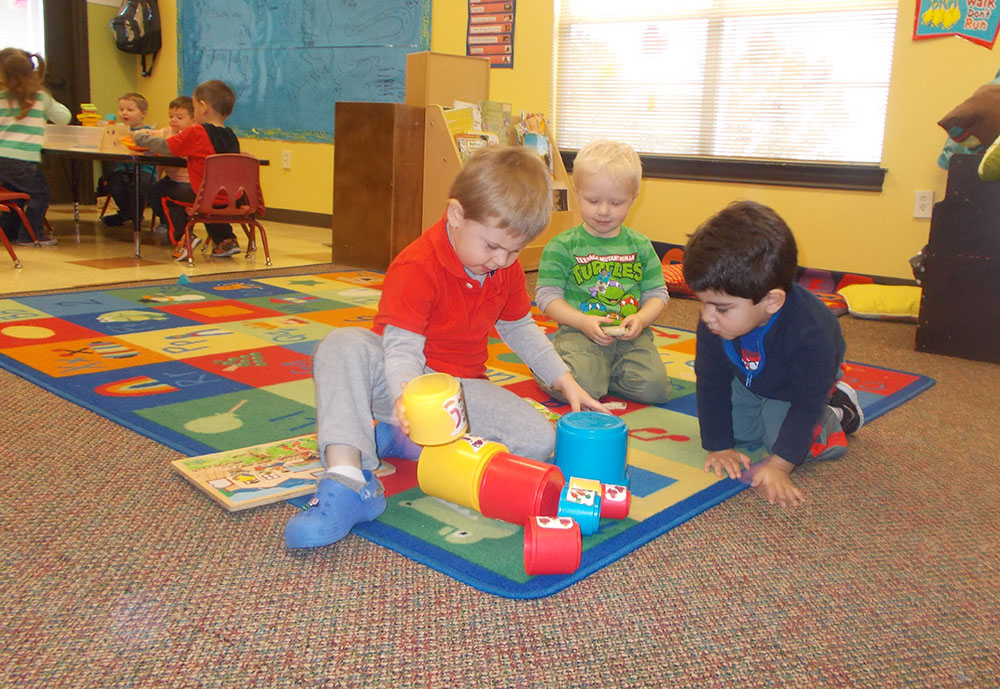 preschool children playing in classroom at a Preschool & Daycare Serving San Antonio, TX